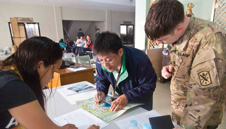 Mappers review their materials in the Philippines.